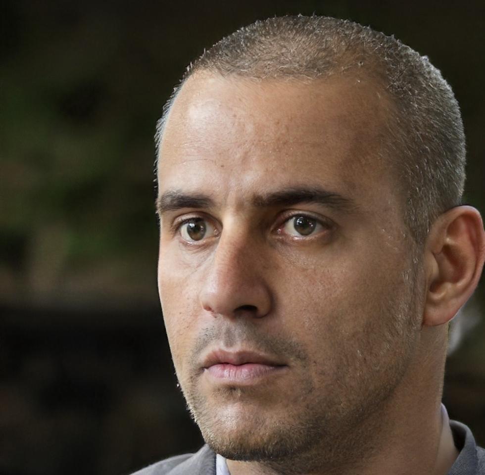 Ritratto di Elia Santoro, docente specializzato in automazione finanziaria